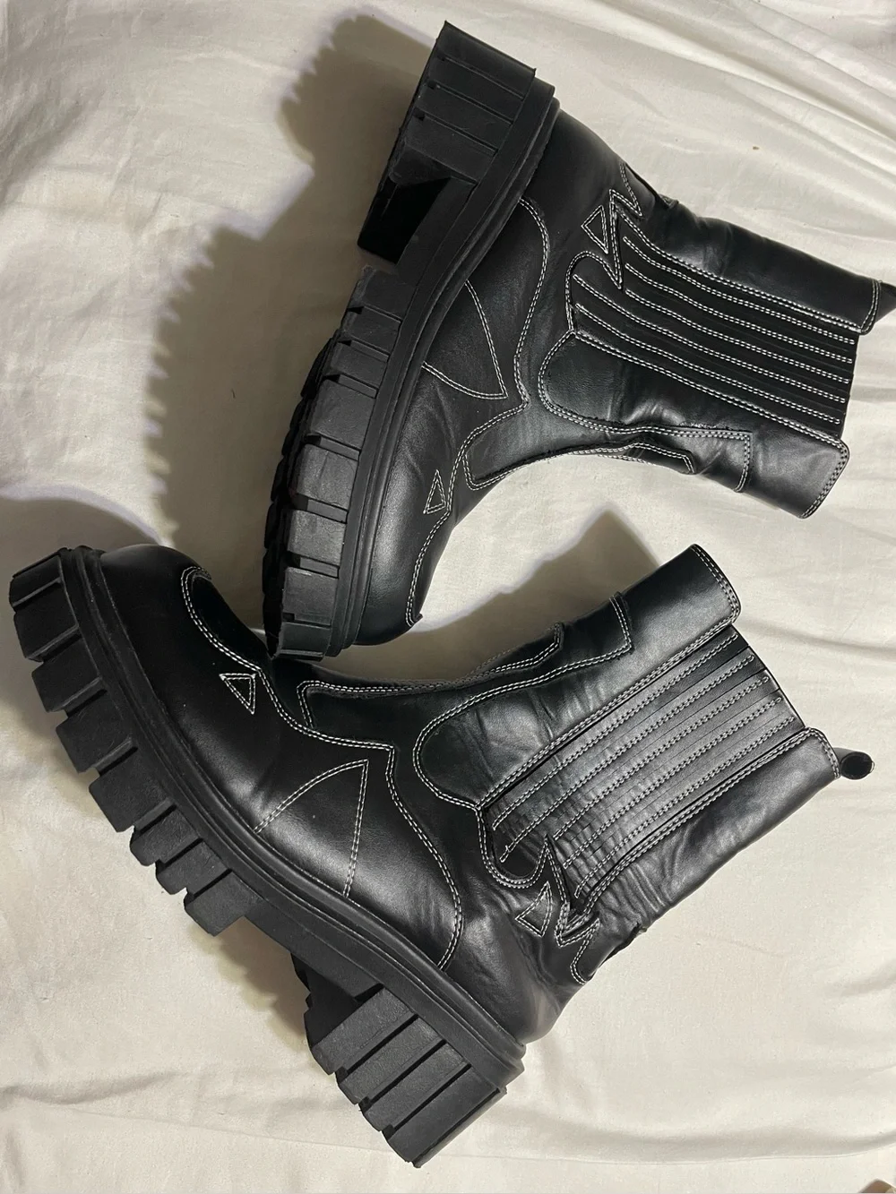 Women's Black Lug-Sole Chelsea Booties with Contrast Stitch
